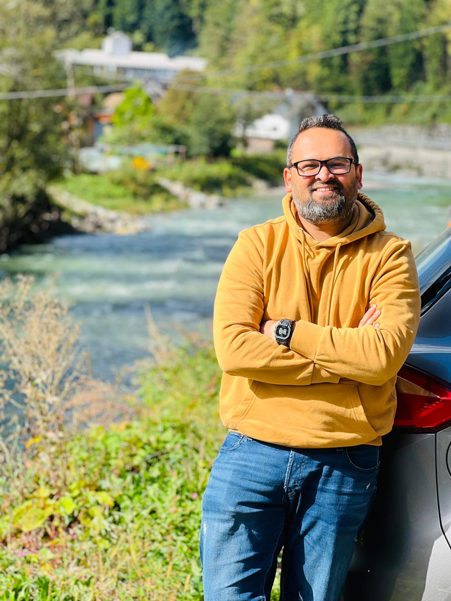 Hameem Russel beside an alpine river in Switzerland
